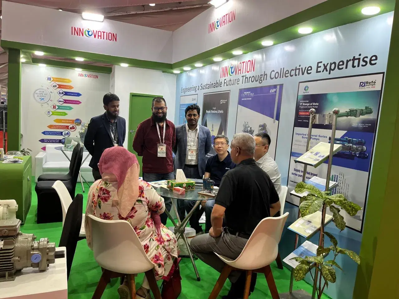 Customers meeting the Innovation Nexus team at the exhibition stand